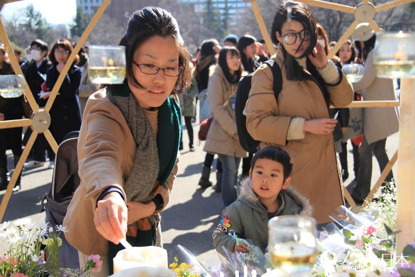 东京民众举行集会纪念东日本大地震三周年（组图）【6】