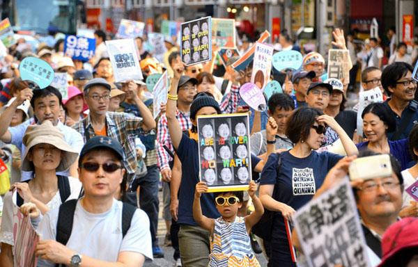 23日，大阪。當天日本全國64個地區同時舉行抗議活動，反對安保法案。（圖片來源：朝日新聞）