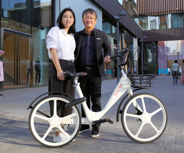 摩拜单车发布白色新车型 日本设计师执笔