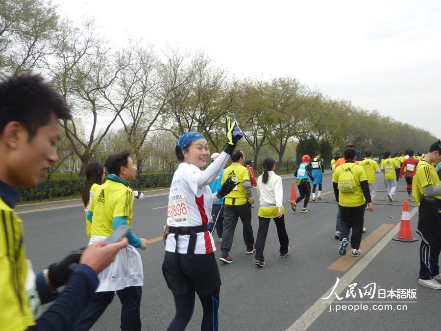 2012北京马拉松赛举行 日本选手正常报名参赛